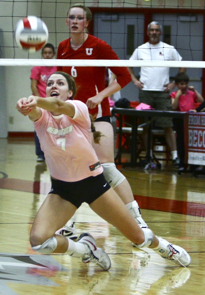 	Senior Jade Michaelsen dives to keep the ball in play Saturday at Johnson Center. In the Lobos’ 3-1 victory over Utah, Michaelsen broke the UNM career assist mark with 3, 838.