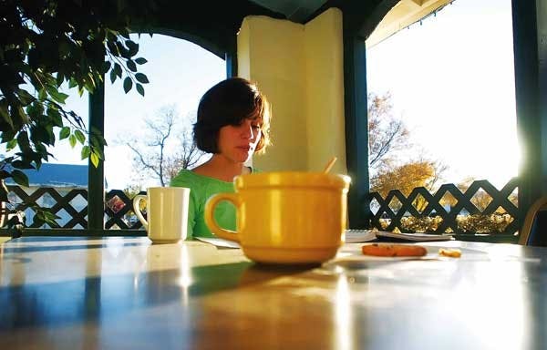 Student Sara Carrion studies on the patio at Yusif's Cafe on Tuesday.