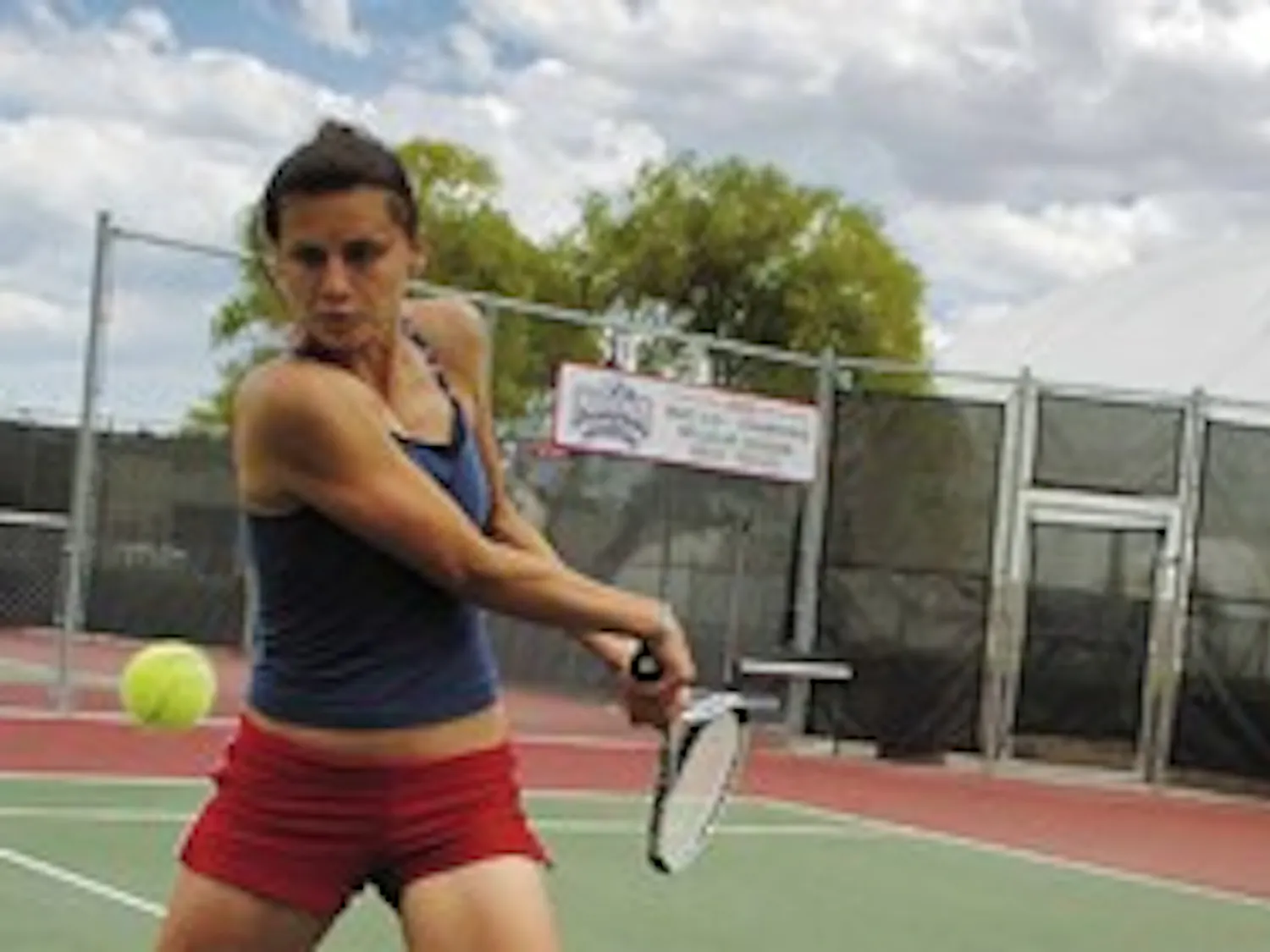 Iva Gersic, left, backhands the ball during practice at the UNM Tennis Complex on Friday. Gersic and her doubles partner, Maja Kovacek, are ranked No. 4 in the nation.