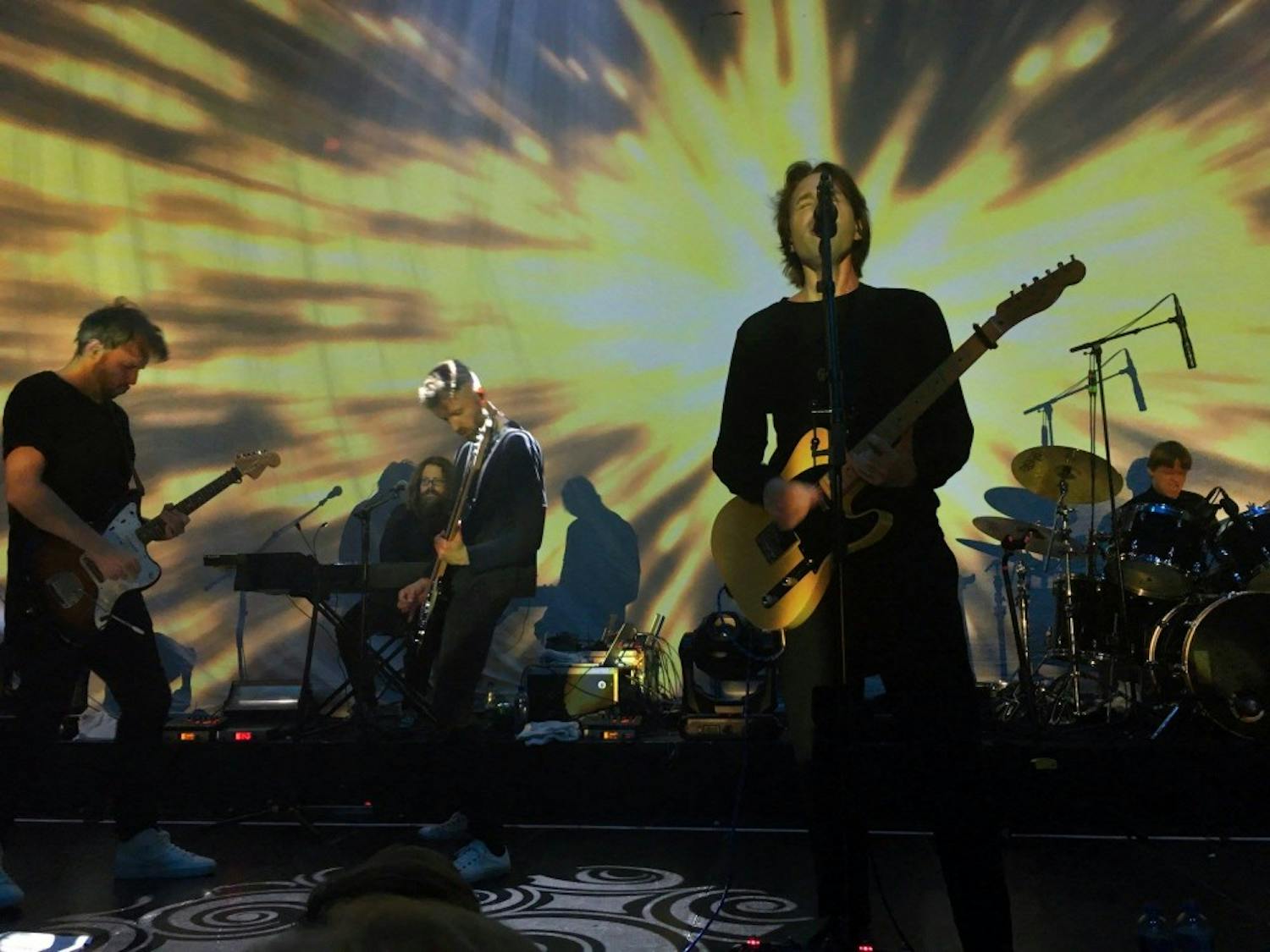 Mew performing at the Paradiso in Amsterdam. From right:&nbsp;Utke Graae Jørgensen, Bjerre, Wohlert. Supporting musicians Nick Watts (keyboards) and Mags Wegner (guitar) are also pictured. Photo taken by @Earthling69.