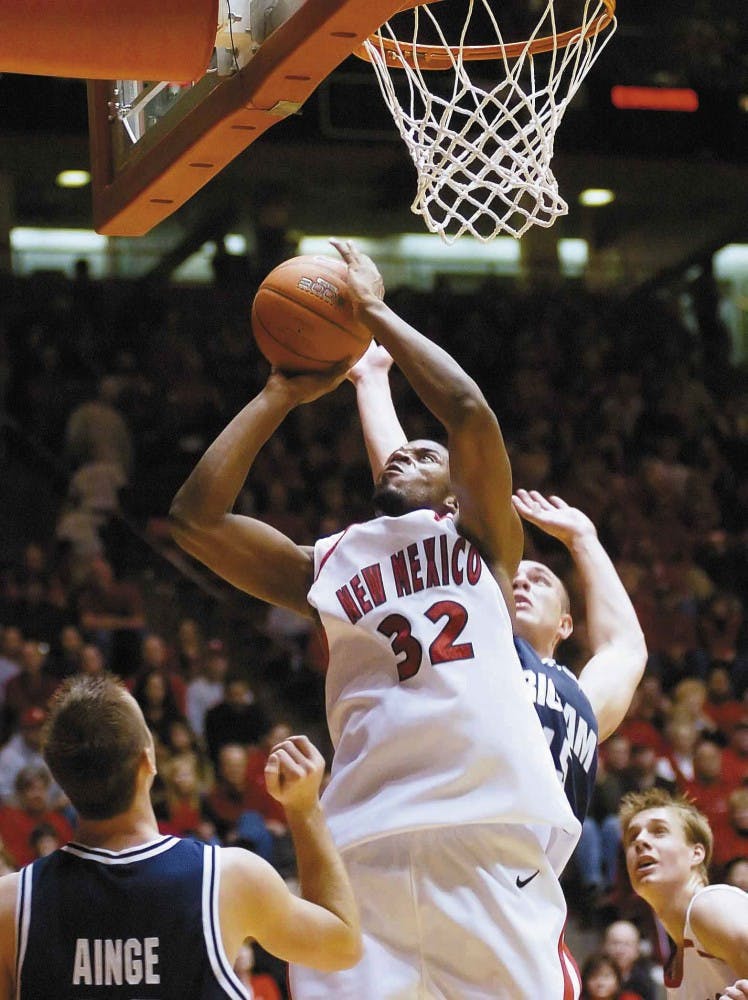 UNM forward Tony Danridge goes for a layup during the second half of Wednesday night's game at The Pit. The Lobos lost to Brigham Young 70-49.
