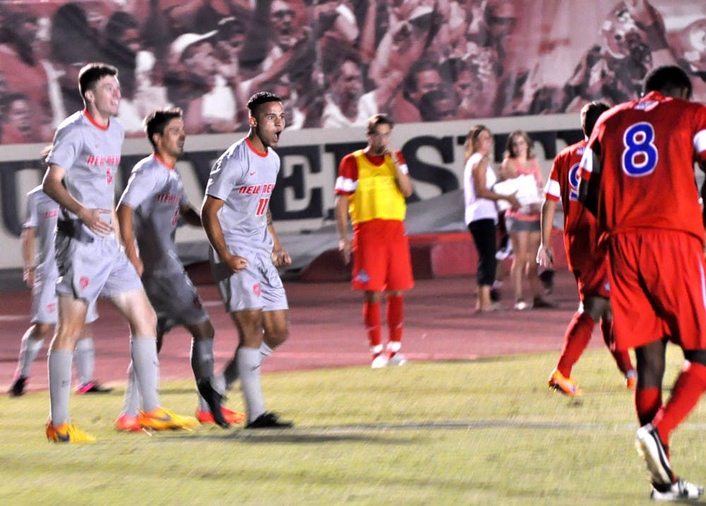 Lobo forward Niko Hansen rejoices with his teammates during their game against the Eagles Sunday Sept. 20, 2015. Hansen and his teammate Nicholas Rochowski have been awarded Conference USA Player of the Week. 