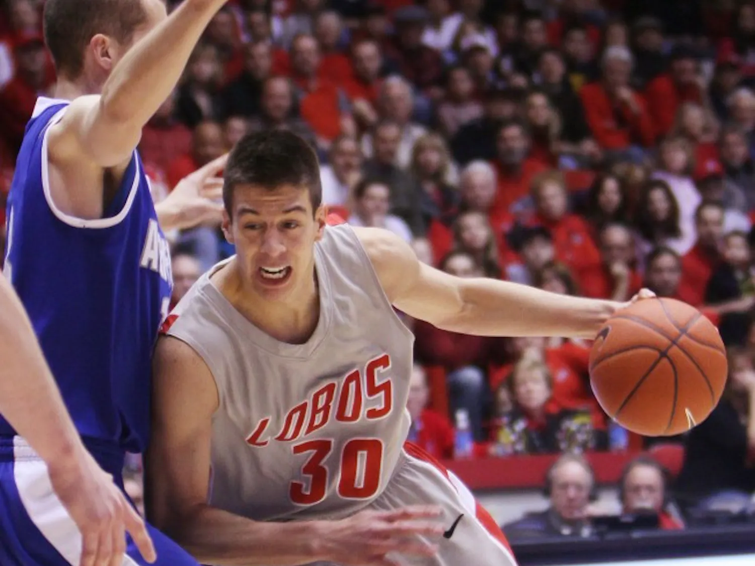 Roman Martinez slashes past an Air Force defender. The Lobos’ lone senior will play in The Pit for the final time tonight against TCU.
