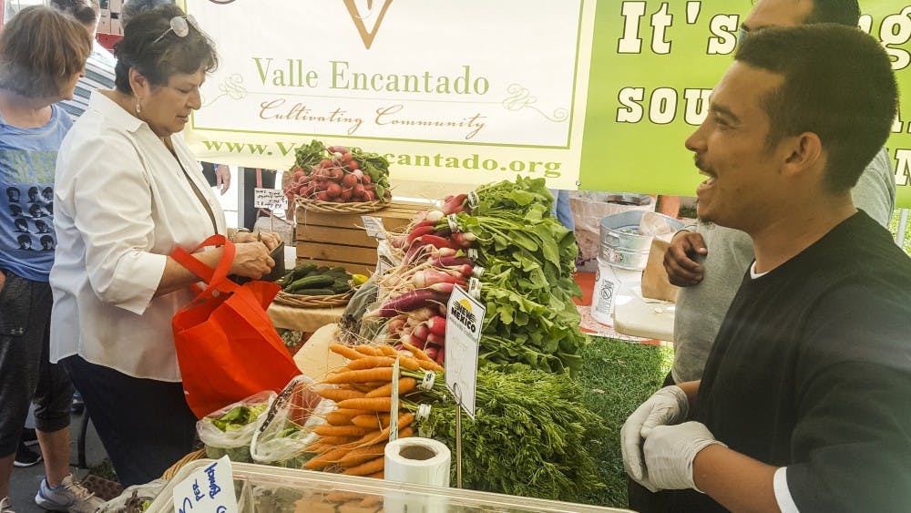 Valle Encantado growers sell locally grown produce at Robinson Park.&nbsp;