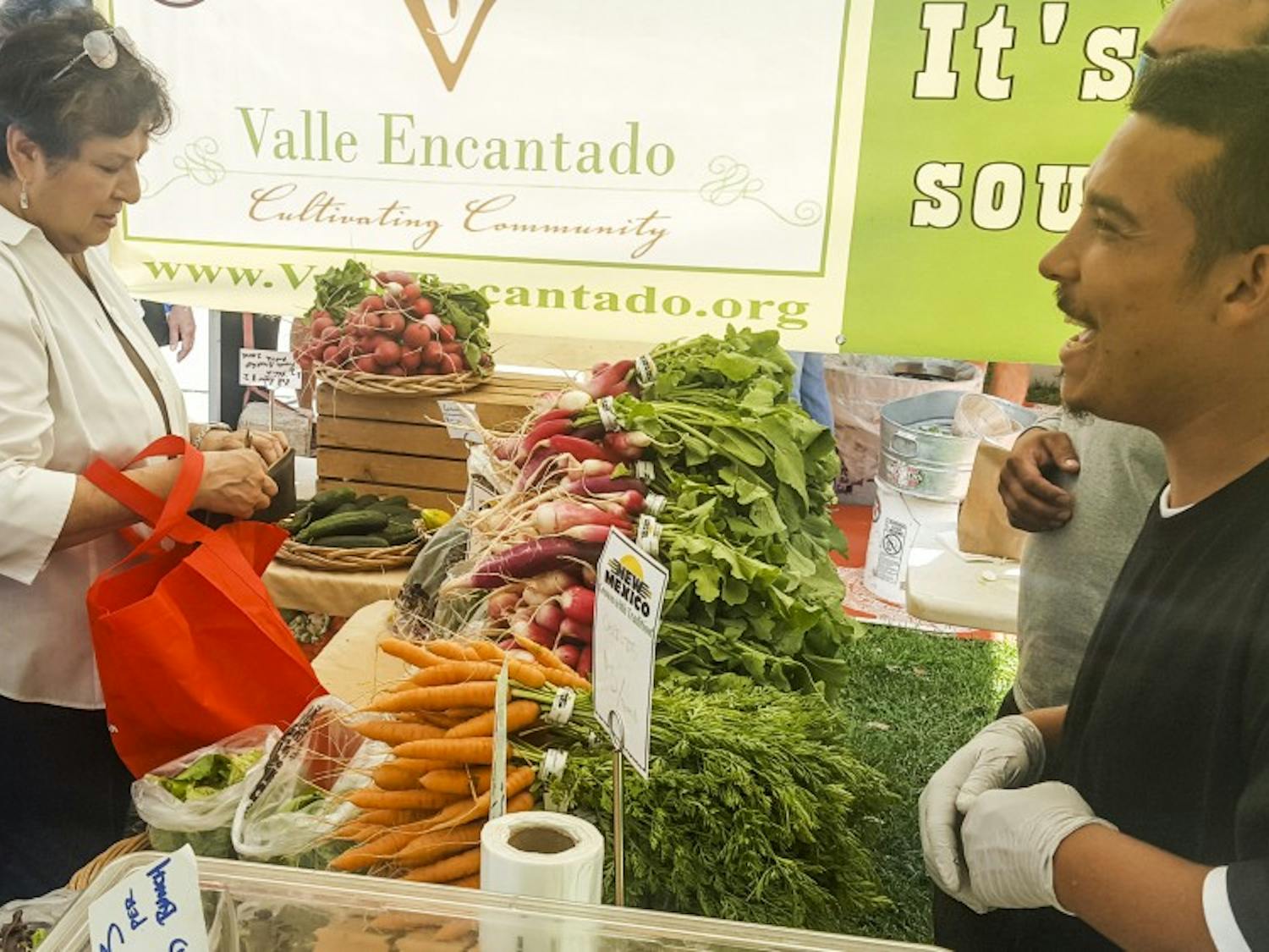 Valle Encantado growers sell locally grown produce at Robinson Park.&nbsp;