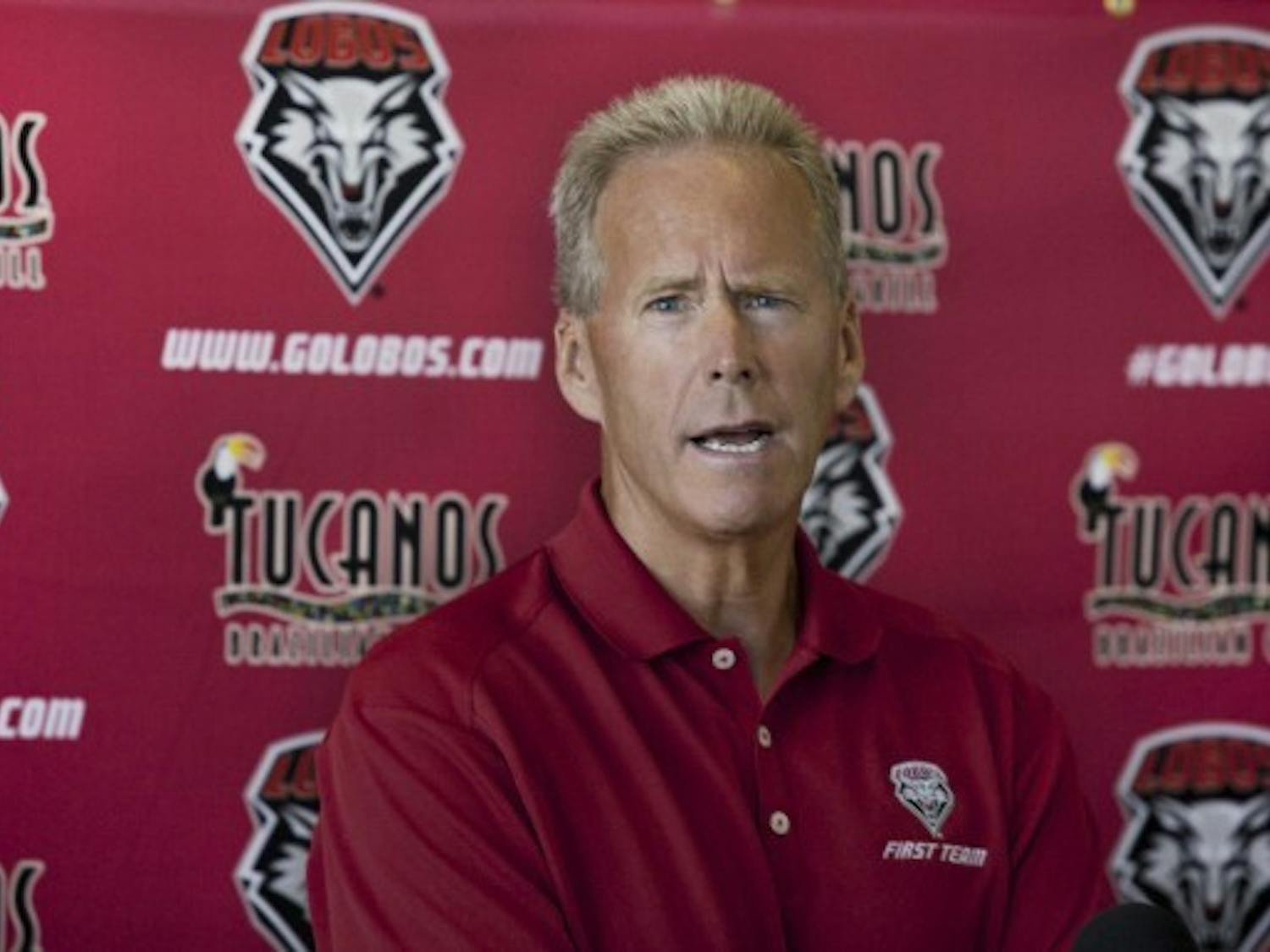 UNM head football coach Bob Davie speaks to the media during a press conference.