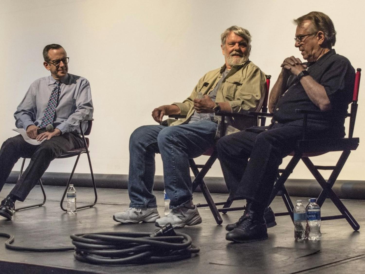 Tom Azzari, right, and Tom Cherones, center, UNM alumni, talk about their experiences working on the set of the television series&nbsp;“Seinfeld” during the "Master of Your Domain" Town Hall hosted at Rodey Theatre, on Tuesday, September 26, 2017. David Weiss, far left, Department Chair of the UNM Communications and Journalism Department moderated the panel discussion.