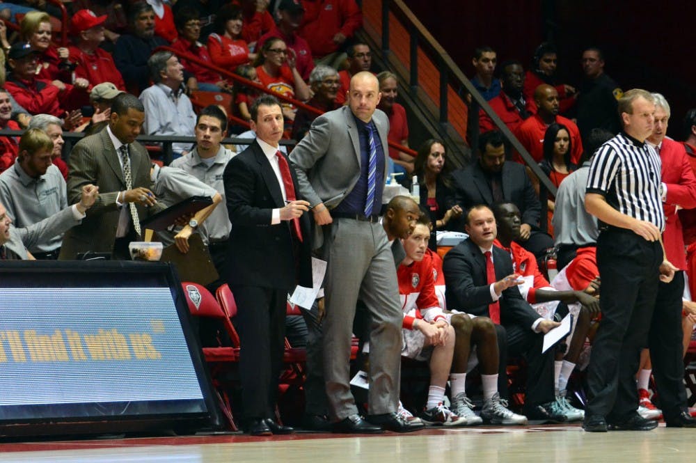 	New Mexico assistant coach Craig Snow, center, has accepted the head coaching position at New Mexico Highlands University in Las Vegas. Snow spent three seasons with the Lobos.
