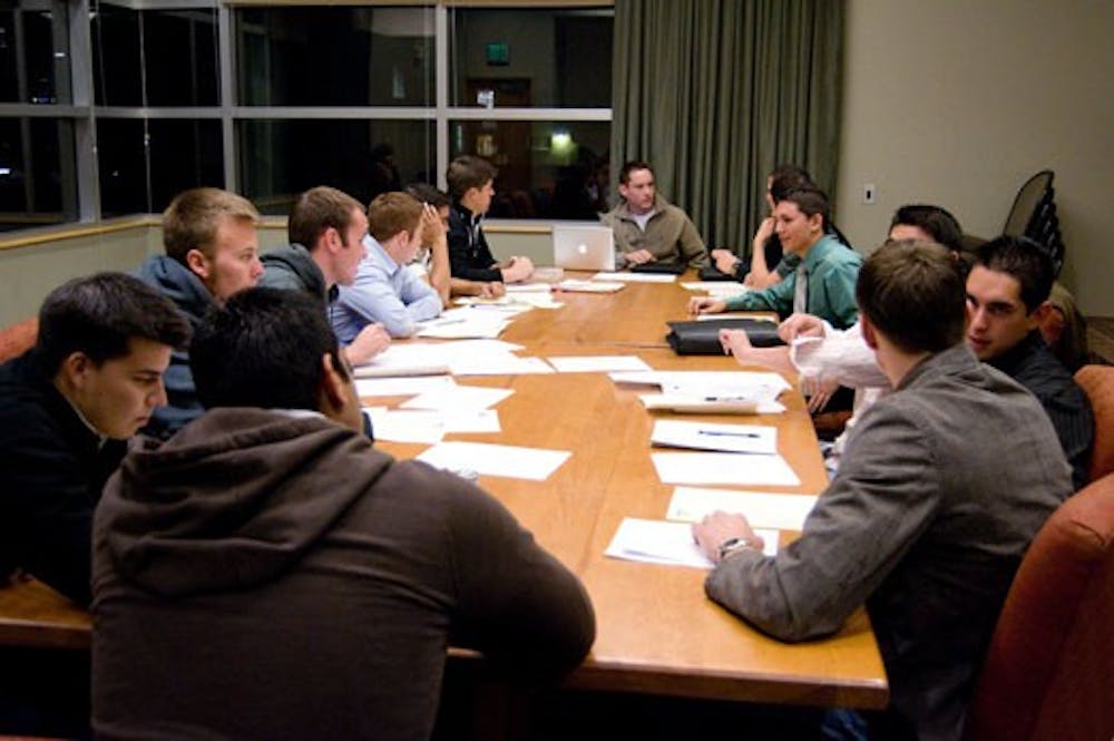 Members of the Interfraternity Council vote on a new president Monday night.