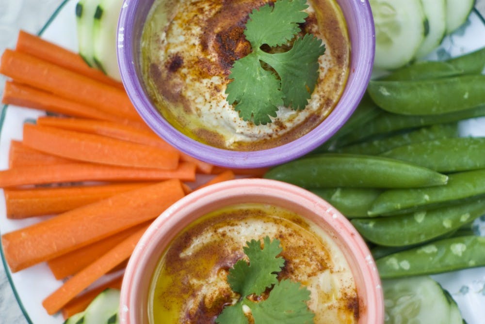 	Baba ganoush, top, and hummus make for delicious snacks.