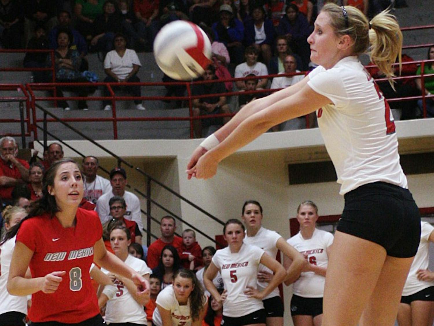 Lisa Meeter volleys the ball against BYU on Saturday at Johnson Gym. The Lobos came out victorious, sweeping the Cougars 3-0.
