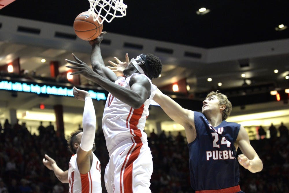 Junior center Obij Aget steals a rebound from CSU Pueblo's Nelson Kahler Tuesday night at WisePies Arena. The Lobos beat the Thunder Wolves 96-84.&nbsp;