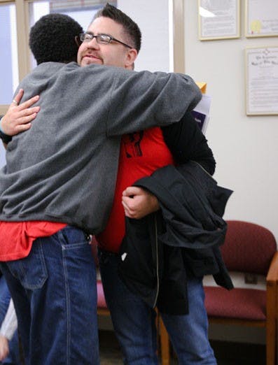 Tarance LeNoir, left, congratulates Christopher Ramirez, who was elected GPSA president Friday.  