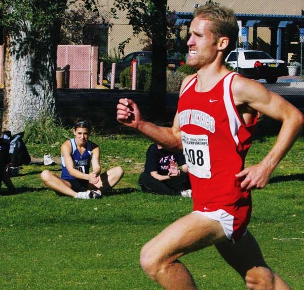 UNM's Jeremy Johnson runs toward the finish line during the Mountain West Conference Championship on Saturday at North Golf Course. Johnson won the conference title. 