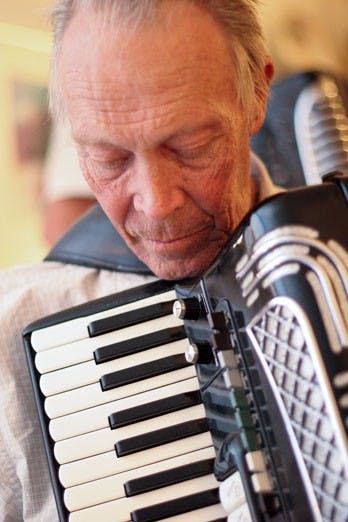 The Albuquerque Accordion Club will meet tonight at the Bear Canyon Senior Center.  Dick Sons plays his accordian. 