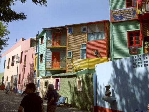 Above: Citizens shop in La Boca, a neighborhood of artisans, in Buenos Aires, Argentina, on March 13. TOP: The Precordillera Range in the foothills of the Andes.