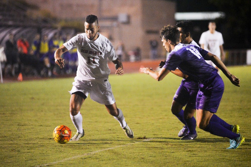 Senior forward Niko Hansen evades Grand Canyon University players on Sunday, Sept. 11, 2016 at the UNM Soccer Complex. The Lobos will face off with UC Irvine on Saturday in Irvine, California.