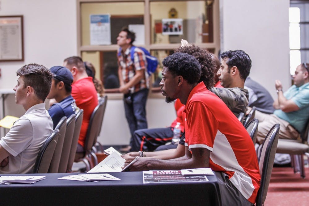Former UNM basketball Devine Williams sits during an athletic symposium UNM held on Monday, March 27, 2017 at the SUB. The event included assistant couches and past athletes from UNM talking about the athletic department and what it is to be an athlete at the university.
