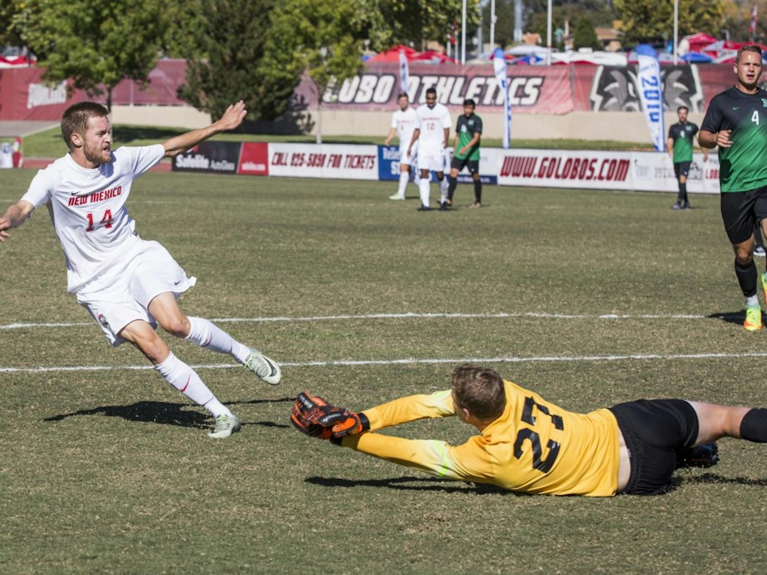 Redshirt senior midfielder Chris Wehan fires a shot past a Marshall goalkeeper to score the Lobos second goal at the UNM Soccer Complex Saturday, Oct. 22, 2016. The Lobos&nbsp;will play UAB this Wednesday.&nbsp;