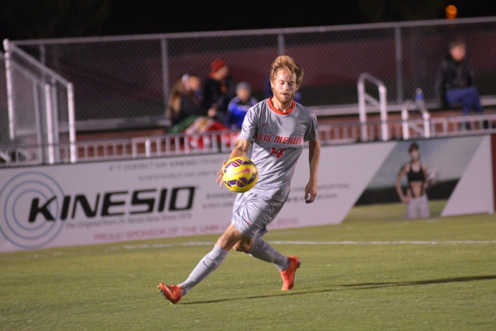 UNM midfielder Chris Wehan kicks the ball to his teammate&nbsp;at the Soccer Complex on&nbsp;Tuesday, Oct. 27, 2015.&nbsp;The Lobos lost to Charlotte&nbsp;0-2.&nbsp;