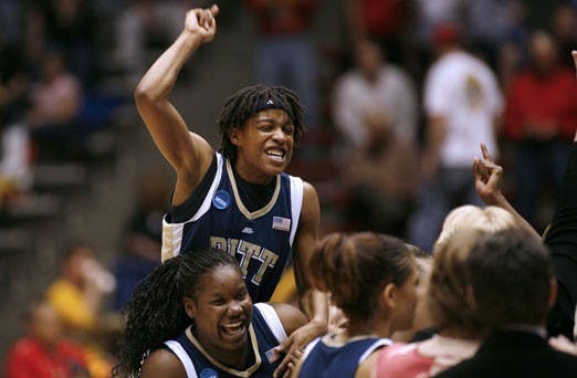 Pittsburgh Panthers guard Shavonte Zellous celebrates with teammate Marcedes Walker after beating the Baylor Bears in the second round of the 2008 NCAA Women's Basketball Tournament at The Pit. Pittsburgh won 67-59.