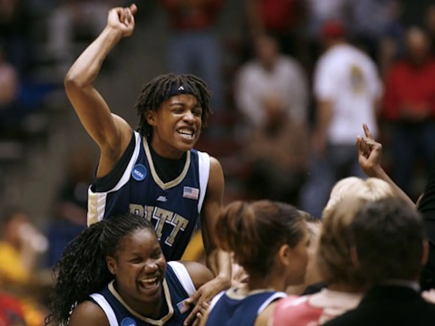 Pittsburgh Panthers guard Shavonte Zellous celebrates with teammate Marcedes Walker after beating the Baylor Bears in the second round of the 2008 NCAA Women's Basketball Tournament at The Pit. Pittsburgh won 67-59.