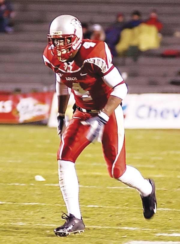 UNM wide receiver Marcus Smith runs downfield after a UNLV kickoff on Saturday at University stadium. The Lobo's won 27-6.