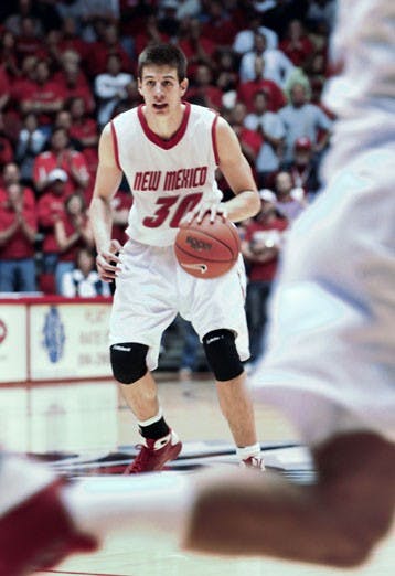 Roman Martinez drives the lane against SDSU on Saturday. Martinez chipped in 17 points in the Lobos' win.