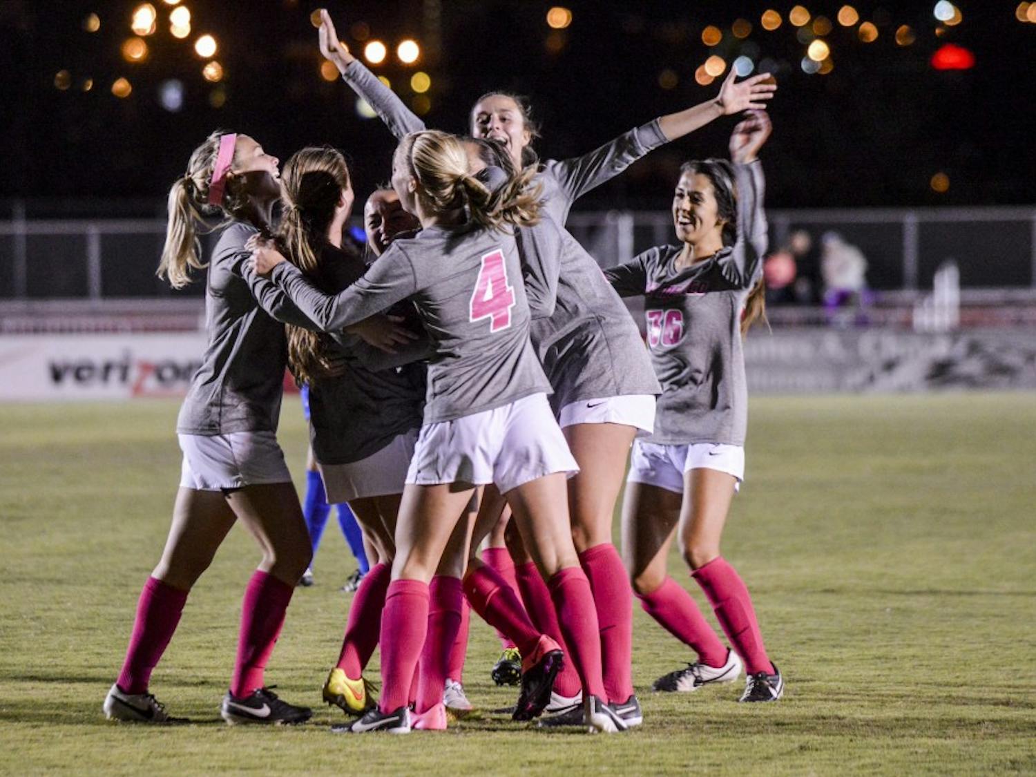 The women’s soccer team form together to celebrate their victory against San Jose State late in the fall 2015 season. The Lobos will play California University this Friday in Berkeley, California.