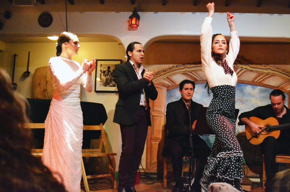 A group of Flamenco artists perform at the El Meson restaurant Saturday night in Santa Fe, New Mexico. Alisa Alba, a UNM dance instructor, puts the finishing touches on one of the dances as the rest of the ensemble cheers her on.