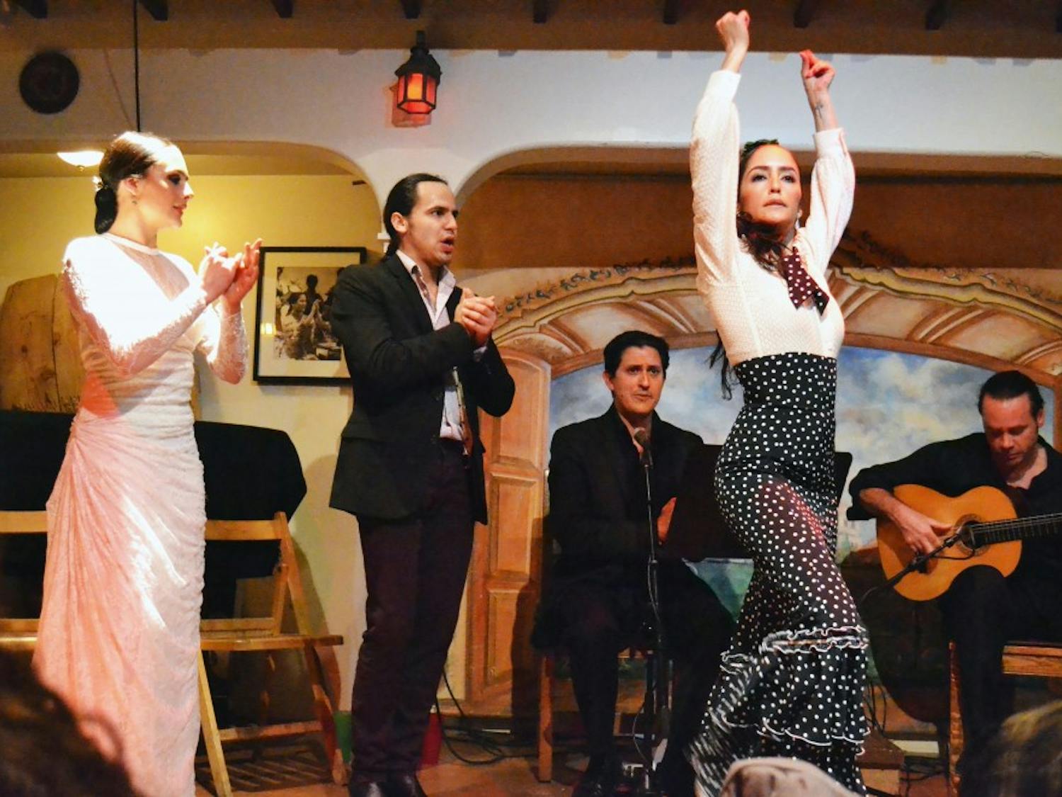 A group of Flamenco artists perform at the El Meson restaurant Saturday night in Santa Fe, New Mexico. Alisa Alba, a UNM dance instructor, puts the finishing touches on one of the dances as the rest of the ensemble cheers her on.