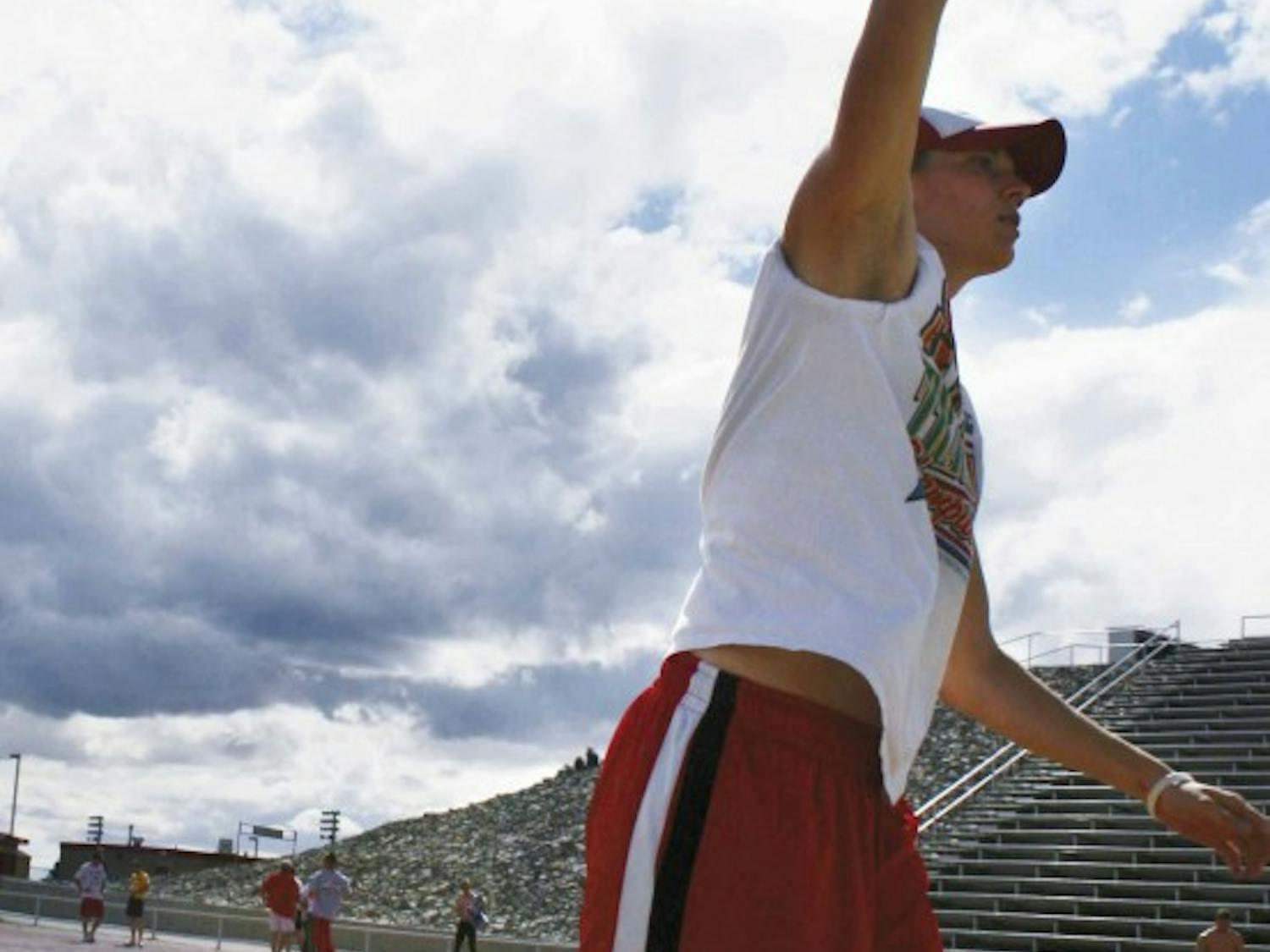 Katie Coronado throws a javelin during practice Thursday at the UNM Track Complex.