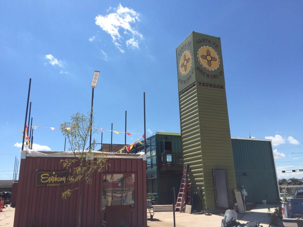 Santa Fe Brewing and Epiphany Espresso’s shipping containers stand as parts to Green Jeans Farmery. Green Jeans Farmery is a district of local businesses that have used recycled shipping containers for their construction materials.