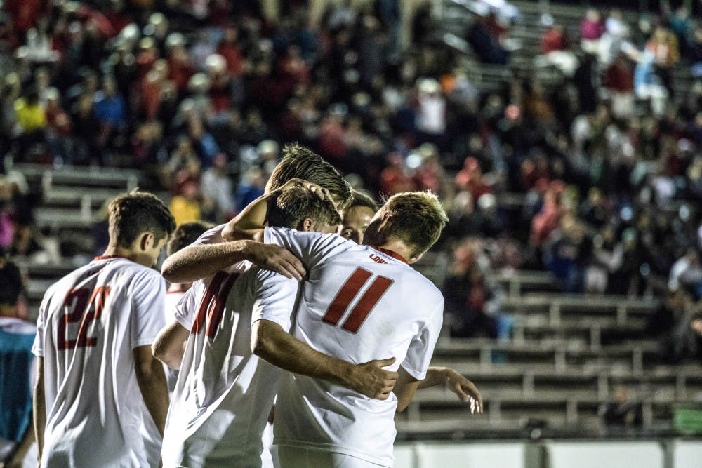 The UNM soccer team celebrates after a goal against University of Alabama Birmingham on Saturday, Oct. 14, 2017. The Lobos defeated UAB 2-0.