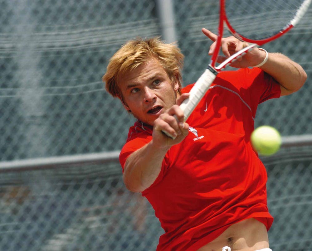 Max Jones hits a forehand during his Mountain West Conference Tournament match against Brigham Young's James Ludlow in Colorado Springs, Colo., on Thursday. UNM lost 4-3. 