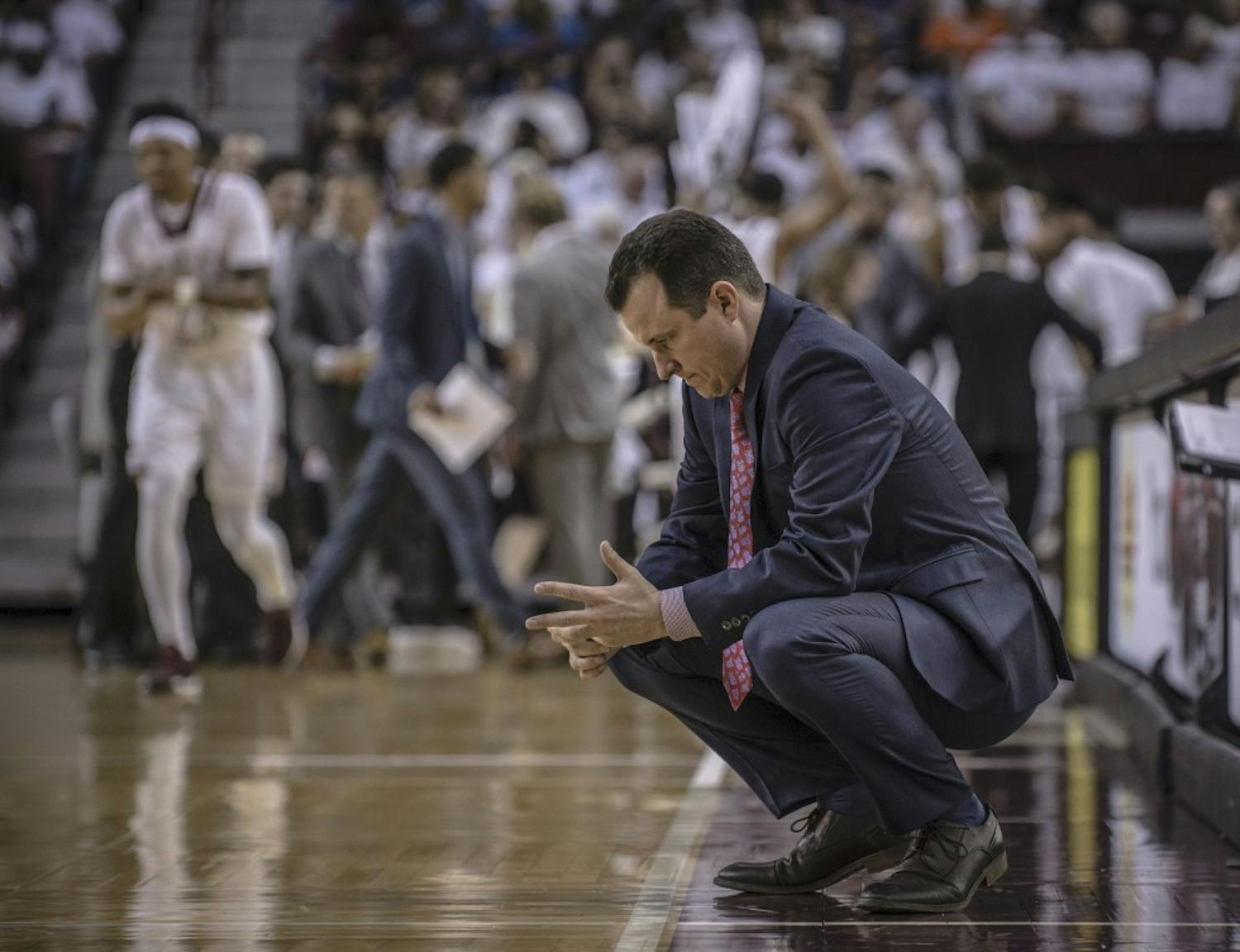 Our go-to photo of UNM basketball coach Paul Weir looking less than thrilled with his team.