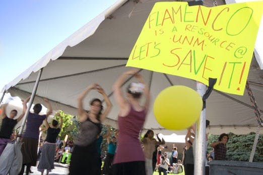 Students in the flamenco program at UNM dance in front of Carlisle Gym on Wednesday. They circulated a petition for the annual internationally-renowned flamenco festival, which was canceled due to financial concerns this year. 