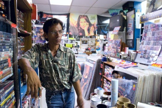 Louie Torres, owner of Rock-N-Reel, one of the more established poster shops in Albuquerque. 