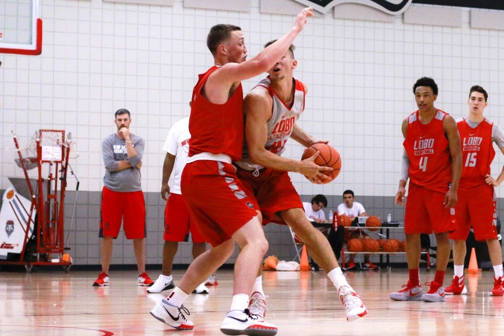 Lobos Cullen Neal (1) guards Dane Kuiper during their practice drills at the Davalos Basketball Center Friday Oct. 2, 2015. Neal is returning from a season ending ankle injury that he sustained a year ago. 
