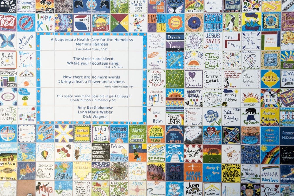 The Memorial Wall at Albuquerque Health Care for the Homeless lists the names of homeless persons that have died since 2003. The tiles were created collectively by artists in ArtStreet, an open art studio implemented by AHCH and available Thursdays and Fridays every week for everyone in the community.