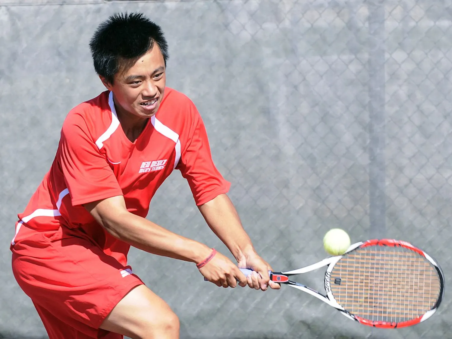 Carl Ho gets after a backhand in this file photo. The Lobos will look to remain atop the Mountain West Conference, despite entering the spring season with a youthful roster.