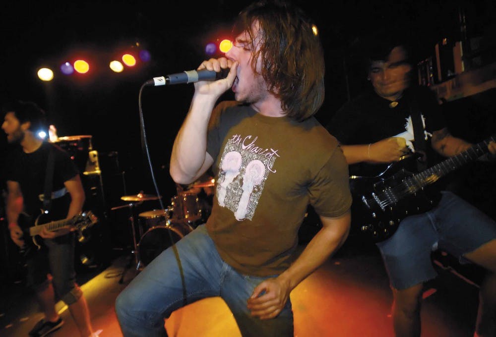 J.P. Schreiner, lead singer for the band Someday, screams during the last song of Sunday's show at the Launchpad. 