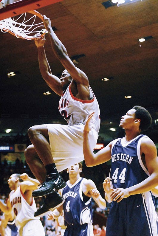 Forward Tony Danridge dunks the ball during Thursday's game against Western New Mexico at The Pit. The Lobos won 98-42.