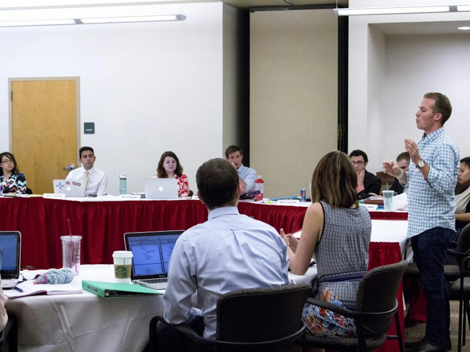 During Wednesday evenings ASUNM Senate meeting, Kyle Stepp approaches the ASUNM board in defense of President Jenna Hagengruber’s decision to hire Kyle Biederwolf as the Emerging Lobo Leaders executive director.