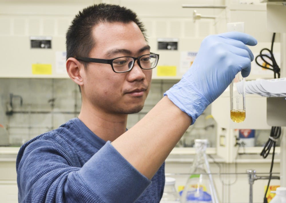 UNM second-year graduate student Xuechen Zhu works on natural product enzyme expression in Clark Hall on Tuesday. The lab of Assistant Professor Dr. Charles Melancon has engineered a potential new screening process for the characterization of antibacterial drugs.