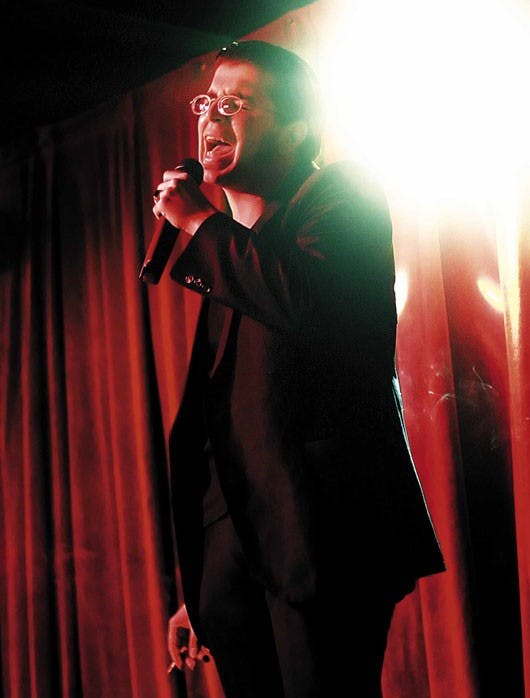 Fernando Gonzales sings Outkast's "The Whole World" at Atomic Cantina's Rockstar Karaoke Extravaganza on Tuesday. "I've been doing this before I was of legal age, mostly at the old Chelsea Street Pub. This is the best game in town. People take it real ser