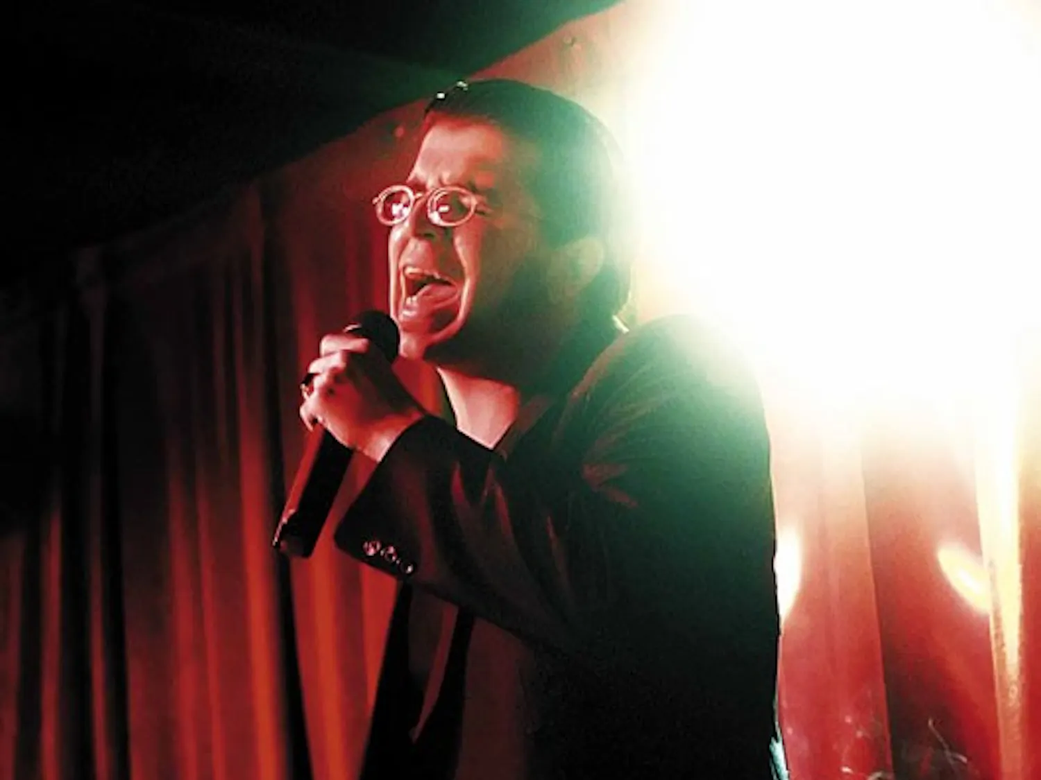 Fernando Gonzales sings Outkast's "The Whole World" at Atomic Cantina's Rockstar Karaoke Extravaganza on Tuesday. "I've been doing this before I was of legal age, mostly at the old Chelsea Street Pub. This is the best game in town. People take it real ser