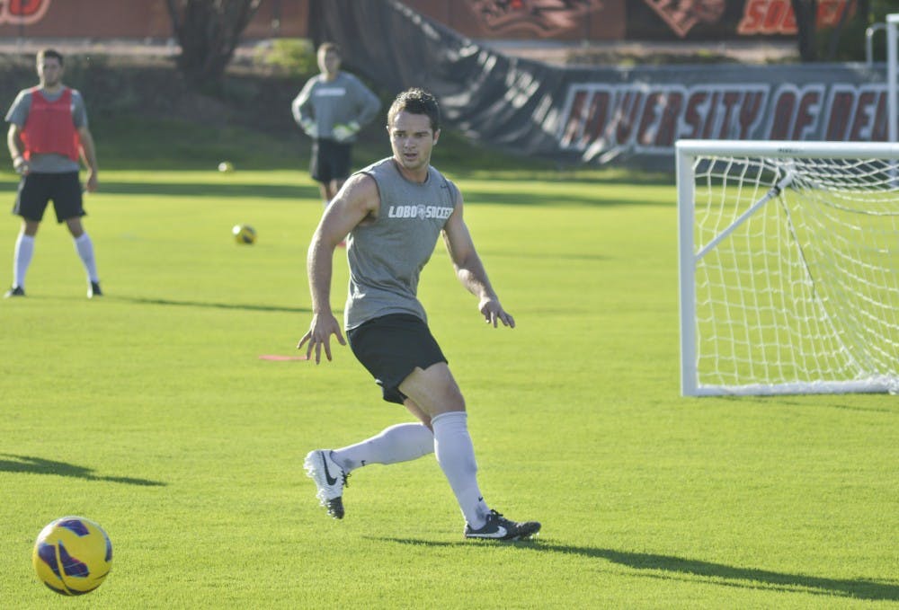 	UNM senior defender Matthew Gibbons follows the ball during an early morning practice at Robertson Practice Field on Aug. 12. Gibbons is expected to be a focal point for the Lobo defense this season.