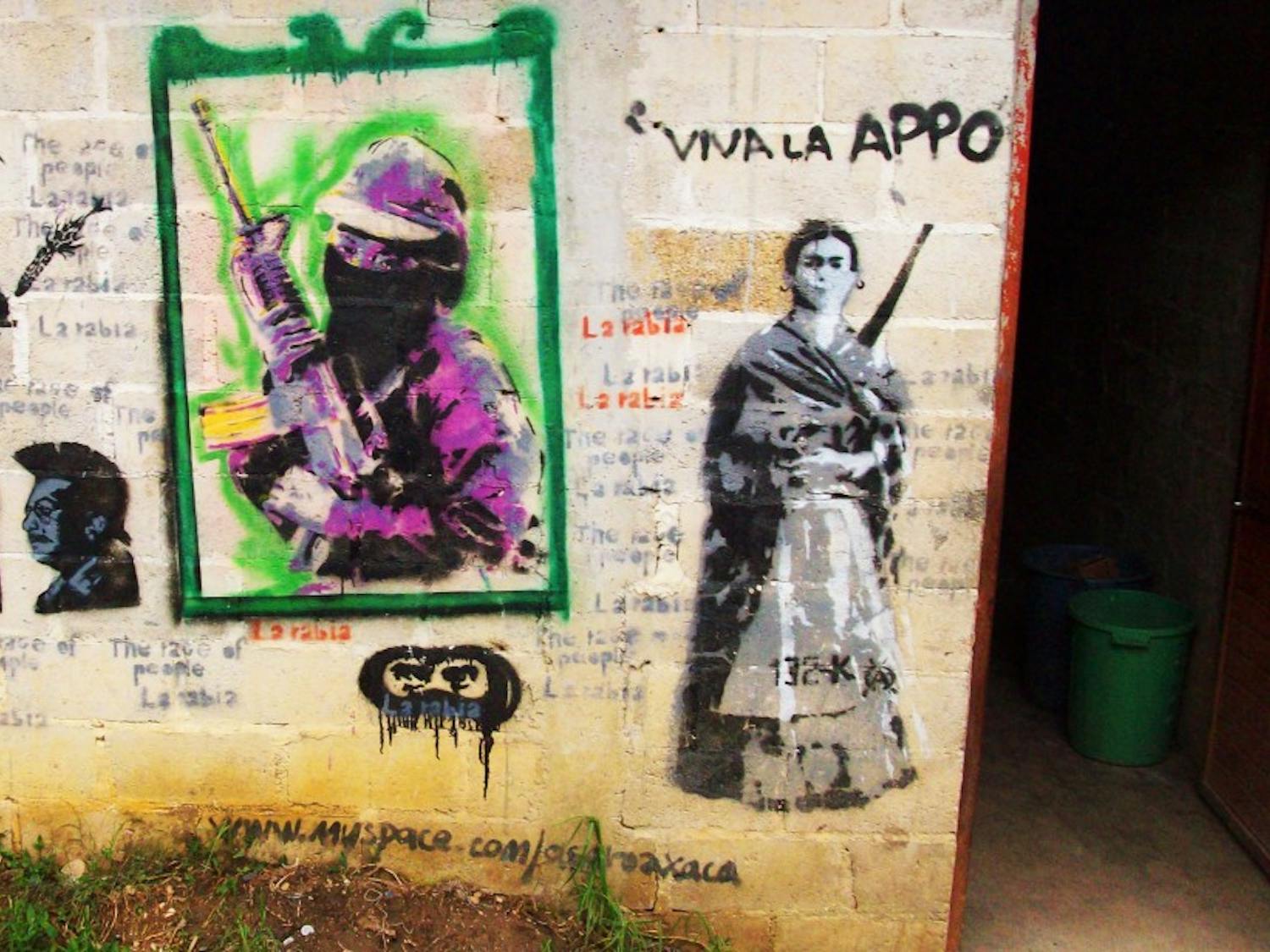	Revolutionary graffiti is displayed on the wall of a student dormitory in Oventic, Chiapas.