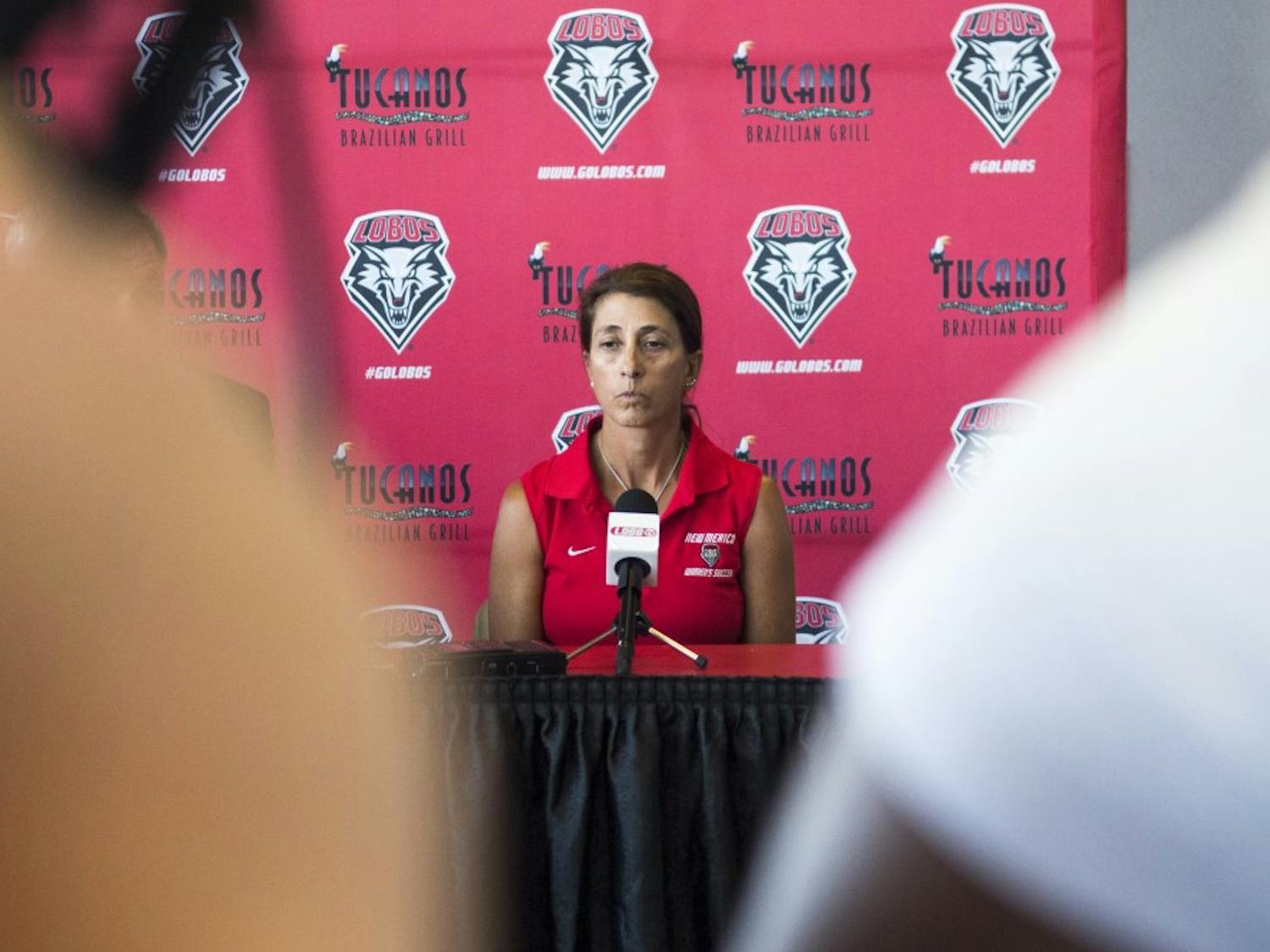 	New Mexico women’s soccer Head Coach Kit Vela awaits questions from the media at the Tow Diehm Athletic Center on Wednesday. New Mexico Athletic Director Paul Krebs announced Friday that 22 women’s soccer players will be suspended for one game and head coach Kit Vela will be suspended for one week without pay for a hazing incident that occurred Sunday night.